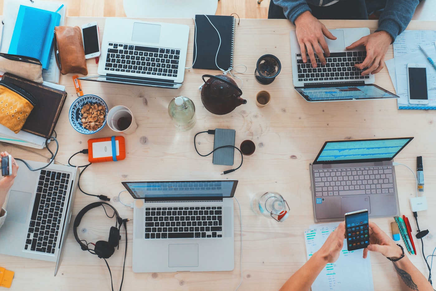 Colleagues collaborating at a workstation